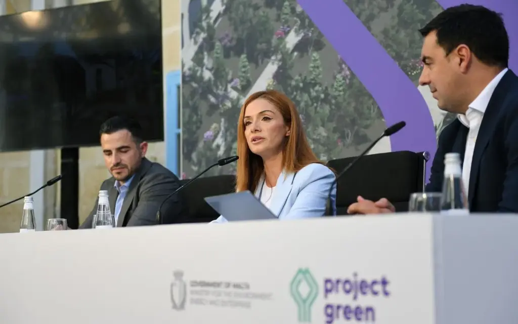 Miriam Dalli speaking over a Project Green logo. Photo credit: DOI